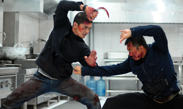 Iko Uwais and Cecep Arif Rahman duke it out in The Raid 2 (2014). Source: The Guardian